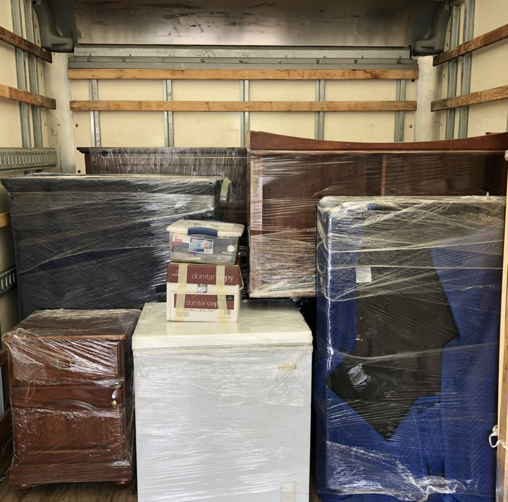 Brandon's crew loading furniture